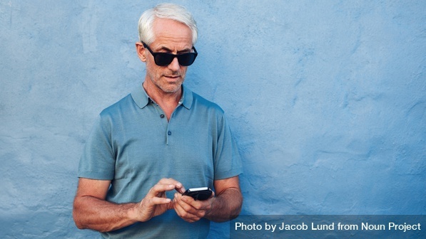 Man Reading his Phone