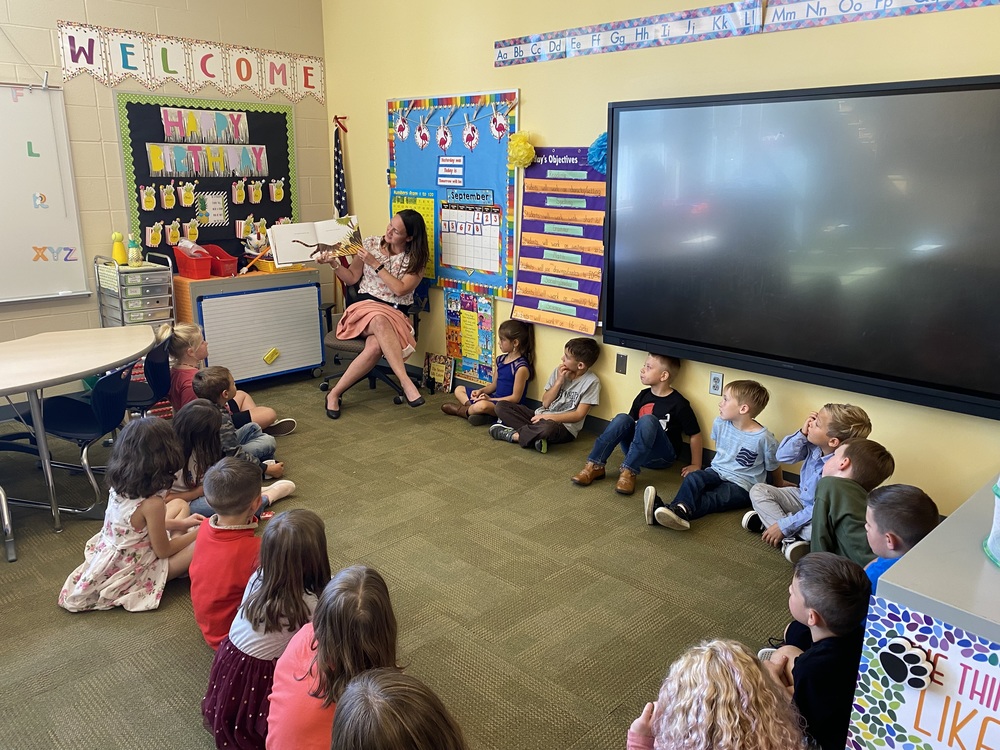 Principal Coquillette Takes a Moment to Read to Classes Highbridge Hill Elementary